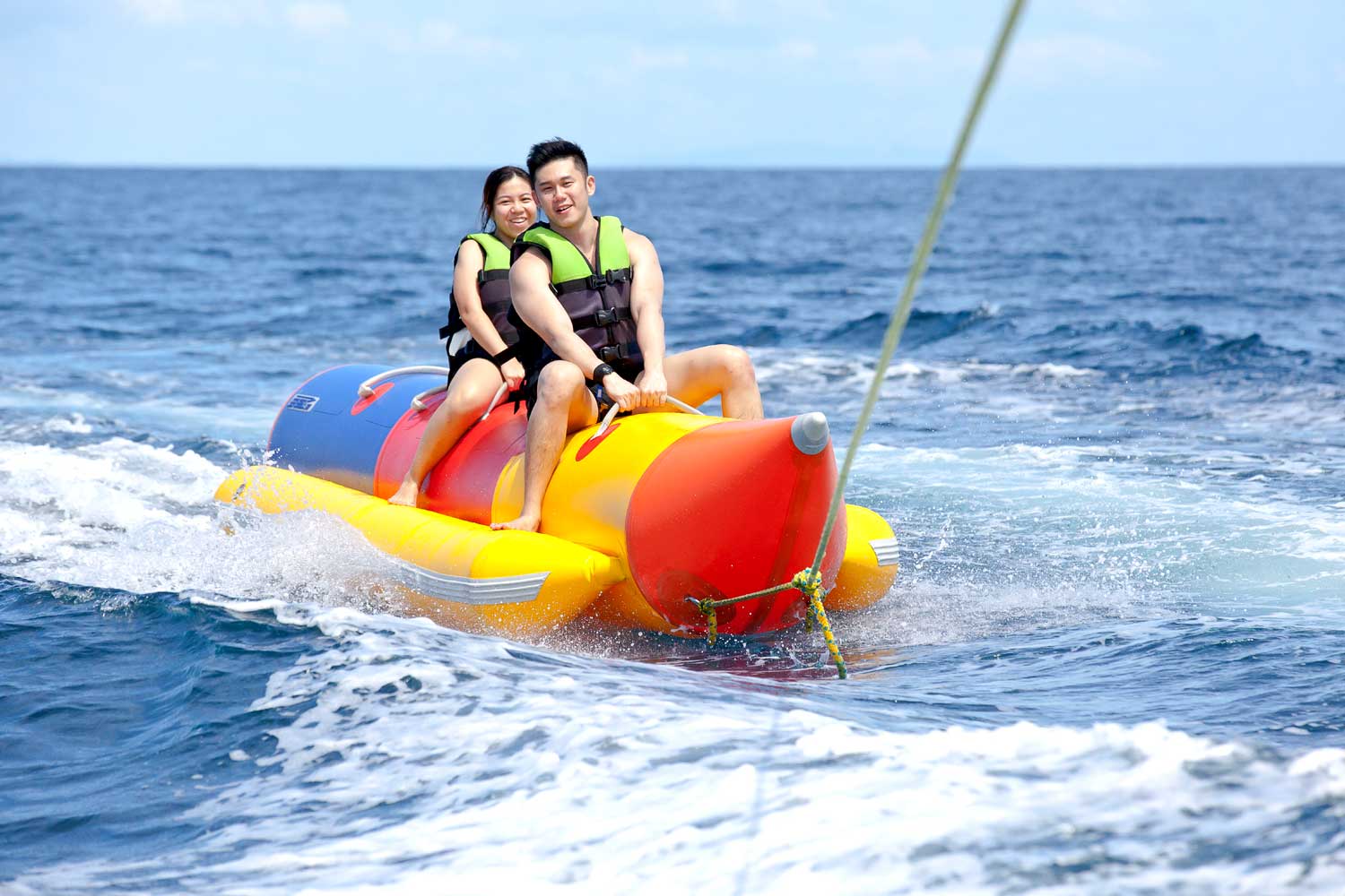 Hilutungan Island + Parasailing + Banana Boat + Simala Monastery Tour